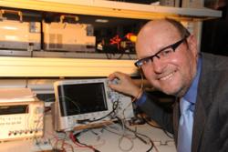 Donald Poirot gets to grips with one of the Oscilloscopes in  the new Lab named after him at 鶹ý's School of Electronic Engineering 