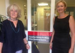 Law graduate Alex Gibson (right), pictured with Liz Du Pré of Bangor University's Miles Dyslexia Centre.