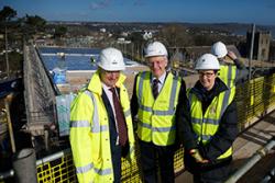 Peter Dodd, Senior Project Manager, Vinci Construction UK Ltd. with Professor John G Hughes Bangor University Vice Chancellor and Professor Carol Tully Pro Vice-Chancellor (Students).