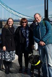 :  Transforming Young Lives report authors (centre) Professor Rhiannon Tudor Edwards and guide dog Jazz, (left) Lucy Bryning and (right) Huw Lloyd Williams of ӰԺ