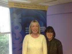 Clare Woodcock (left) pictured here with Prof Jo Rycroft Malone, Head of School of Healthcare Sciences