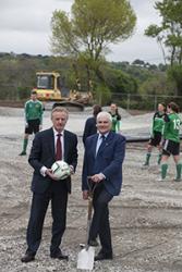 (left) Bangor University Vice-Chancellor, Professor John G Hughes and Bangor City FC Chairman, Dilwyn Jones, with University student Football Team members checking out the site of the new 3G pitch at Nantporth