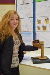 Year 12 pupil of Ysgol Eirias displays her designed lamp