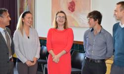 Education Minister, Kirsty Williams, with staff and students from the School of Education and Human Development