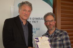 PVC Prof Jerry Hunter (left) presenting Prof Nathan Abrams with his certificate