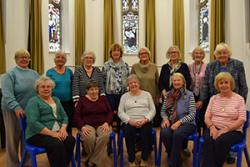 The friends gather for a group photo in Acapella: See end of article for names.