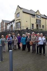  The group enjoy a guided tour around the newly re-designed site, which retains some familiar buildings and names.