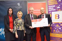 Santander competition judges Diane Roberts, Dr Siwan Mitchelmore and Prof John G Hughes present a cheque to Dr Ned Hartfiel. Ha