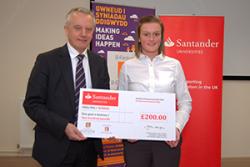 Carley was presentedwith her winning cheque by Professor John G Hughes.