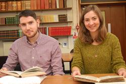 Elen Wyn and Siôn Edwards busy researching in the University's Archive