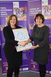 Sheila Brown, Lead Midwife for Education & Course Director for the Bachelor of Midwifery Programme is congratulated on the School’s achievement by Ms Fiona Giraud, Director of Midwifery and Women’s Services at BCUHB.