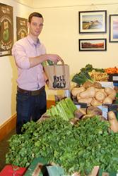 Dan Taylor prepares  some 'soup in a bag' bags for sale.