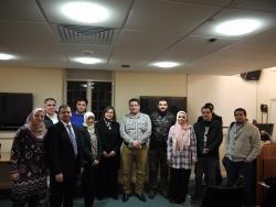 Some of the Iraqi students with Professor Linton after Sinan and Nidham's presentation