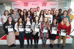 Ellie Frost ( third from right front row) at Silverstone with the other successful engineering students.