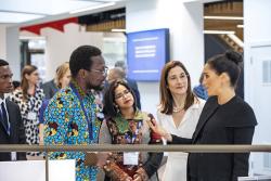 Dr Ephraim Kisangani with Meghan, Duchess of Sussex at the Reception in London