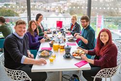 Aled Closs Davies, Gorad Restaurant Manager; Mair Rowlands, Sustainablity Lab; Lydia Richardson,  SU VP Education & Welfare; Ffion Jones, SU; Mark Stanley, SU VP Societies & Communities & Fflur Elin, President, Bangor SU enjoy a Fairtrade breakfast.