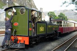 A volunteer fixes the lamp: Ffestiniog Railway.: Flickr