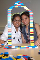 Ishani Chakravorty from India and Julianne Boulton from Sri Lanka undertaking an entrepreneurship challenge using building bricks at the Start up Summer School