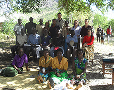 Participants with the farmers during a feedback session.