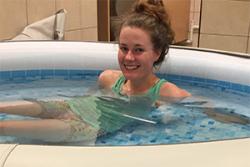 Bethan Davies, Team Wales race walker enjoying a post training session hot bath