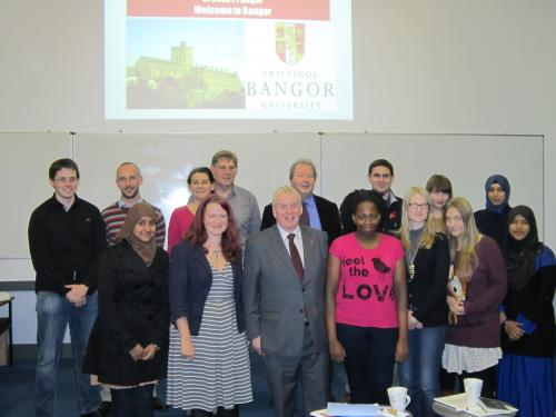 Students from the Big Voice London project with District Judge Owen Williams (front centre) and Bangor's Huw Pritchard, Dr Osian Rees, Gwilym Owen and Aled Griffiths (back row from left).