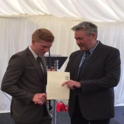 Sam Huddleston (left) receives the Bangor ICF Student Award from Jim Waterson.