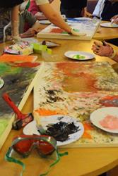 Mixing colours in one of the workshop sessions in a care home.  