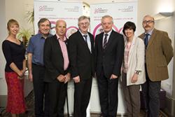 With the Minister (centre) were Dr Gill Windle, Prof Bob Woods, Chris Roberts, who has dementia, Vice Chancellor Prof John G Hughes, Prof Jo Rycroft-Malone and Prof Chris Burton.