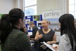 Attendees discuss career options at the Gamlins stand at last year's Law Fair. This year's is expected to be an even larger event.