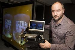 Dr Llyr ap Cenydd demonstrating his Ocean Rift virtual reality software.