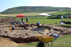  An excavation site ( on this occasion a hilltop enclosure at Meillionydd, near Rhiw, in Gwynedd).