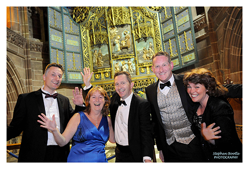 Professor Oliver Turnbull (centre) with Peggy Murphy and her husband (left) and Professor James Intriligator and his wife (right)