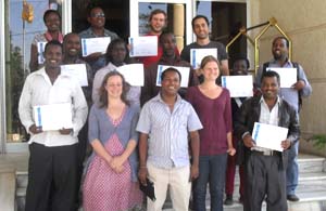 The participants with their certificates