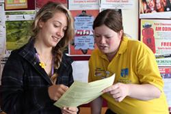 A Peer Guide assists a student at Bangor.