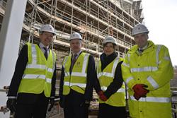 John Griffiths AM on site with Professor John G Hughes, Vice-Chancellor, Elen ap Robert, Pontio’s Artistic Director and Dylan Roberts, Director of Estates at Bangor University