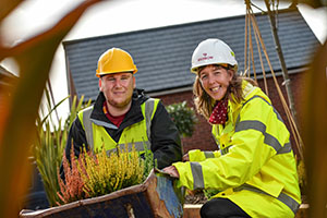 1)	Student Jake Winter with Redrow’s sustainability manager Nicola Owen 