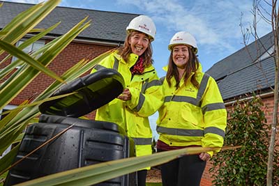 Guest lecturer Nicola Owen with Redrow sustainability assistant Anna Hughes at the Goetre Uchaf development. 