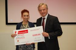 Undergraduate winner Catrin Hicks from the School of Education received her prize from the Vice-chancellor, Professor John G. Hughes.