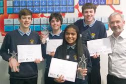 Dr Mike Beckett, Head of Chemistry at Bangor University with the winning team from St Gerard’s School: (left-right) Andreas Alexandrou. Matthew Willis, Shenona Mitta, Jacob Alexandrou.