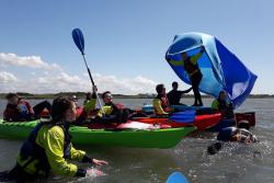 A group experiences sea kayaking and sea kayak sailing.: Image credit: Trys Burke