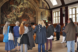 A previous tour view Ed Povey’s Hall of Illusions mural in the University’s Neuadd Powis.