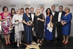 Members of the WHELF Shared LMS team with their award. Flora Lewis (far Right) represented Bangor University at the event.: Image courtesy Times Higher Education