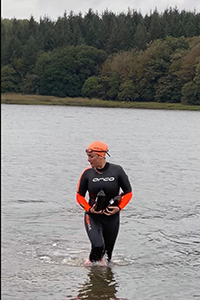 Laura Sanderson collecting water samples on her epic swim