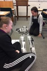 Bryana Donachie and Jessica Hartshorne, both of Rhyl, completing a human skeleton using x- ray images.