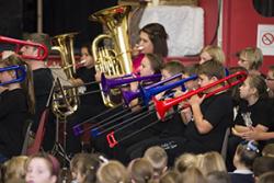 Pupils at Ysgol Maesincla gave Education Minister Huw Lewis a rousing performance.