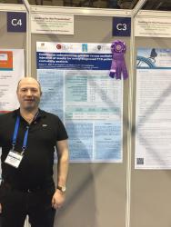 Dr Ridyard with award winning poster