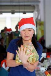 Jessie shows off her festive fingernails as she makes her "Asian salad"