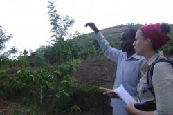 Laura Kmoch, a Bangor MSc Sustainable Tropical Forestry student, interviewing a farmer on his land in Namabya Sub-county, Manafwa District of Eastern Uganda. Photograph taken by Kenneth Eryau, February 2014.