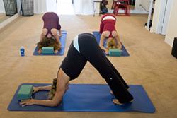 Practicing yoga in the workplace can have very positive benefits for those with back problems.